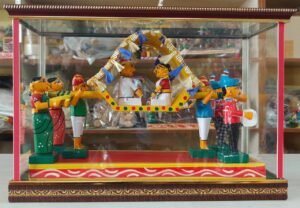 Traditional handcrafted kondapalli palanquin (doli) procession wedding toy set in glass display case